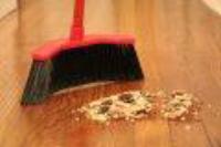 Broom Sweeping Up Floor